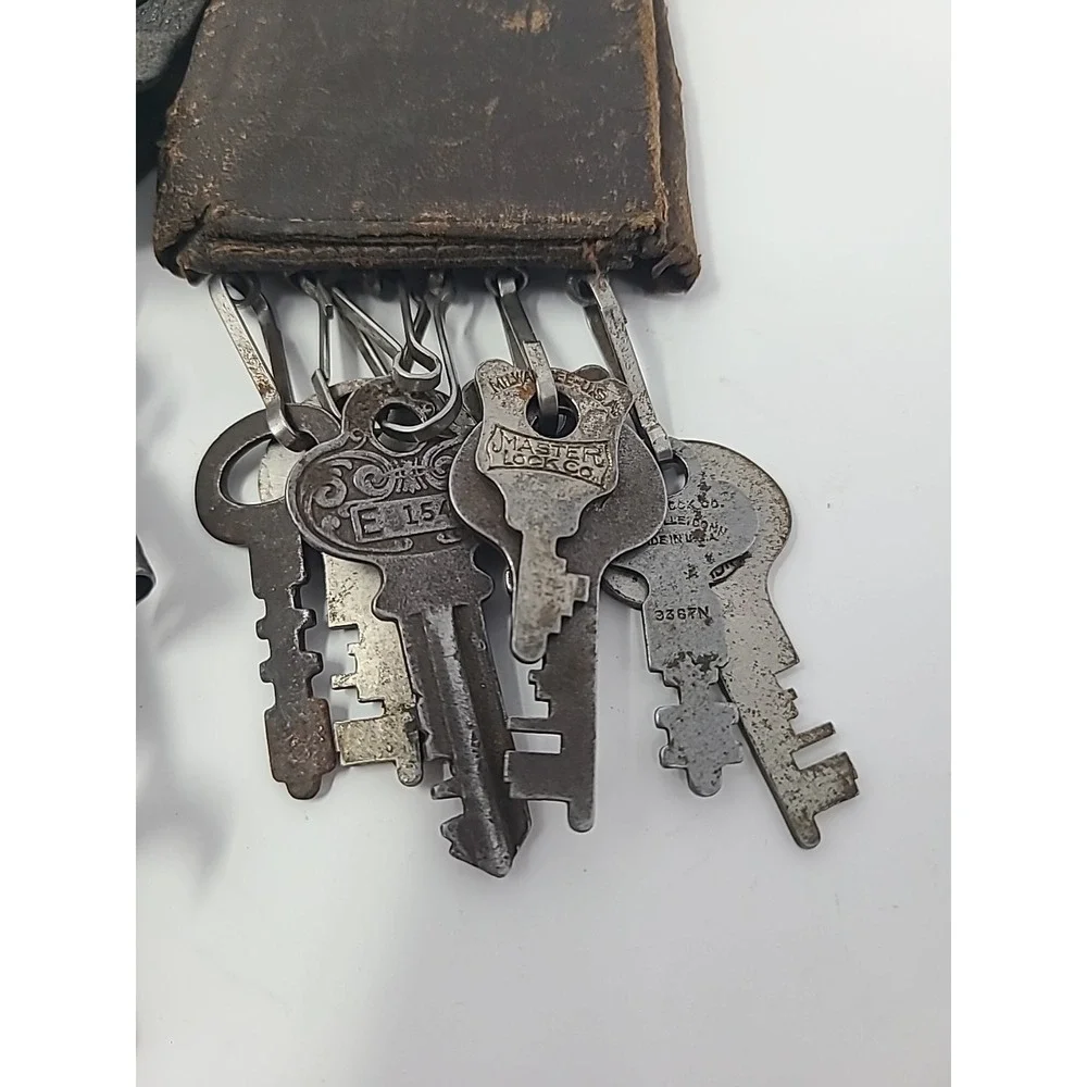Collection Of 17 Skeleton And Other Vintage Keys With Leather Key Holders
